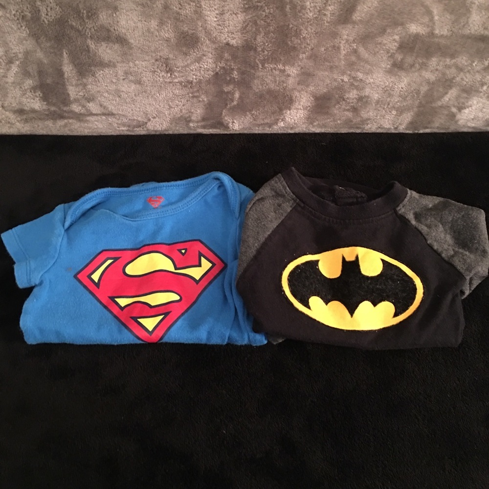 Superman and Batman onesies